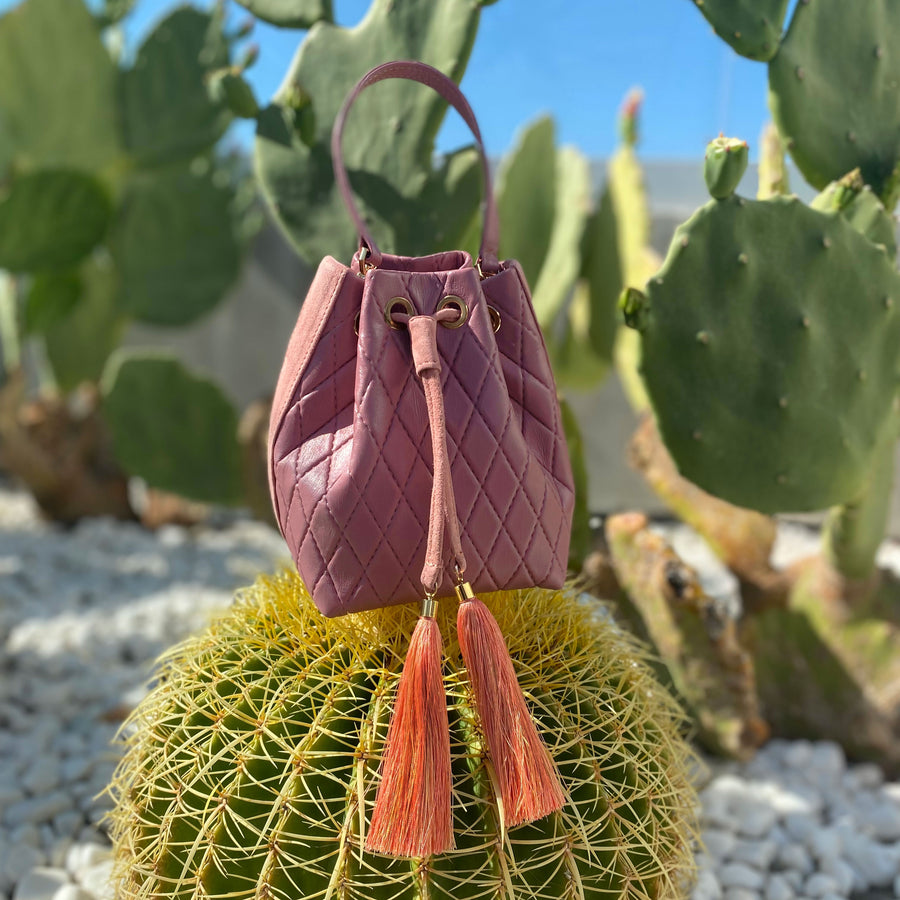 Mikó bag in quilted mauve leather on a cactus
